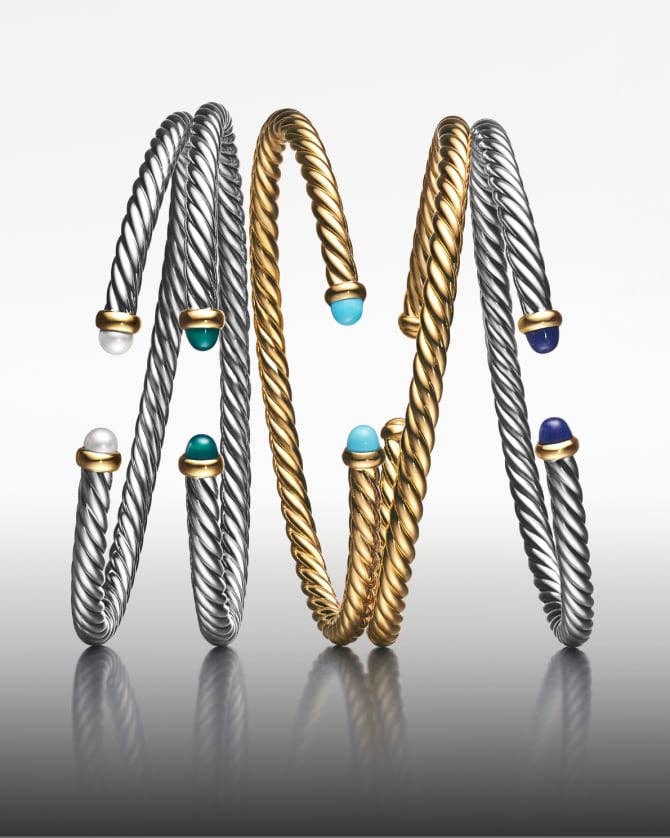 Five David Yurman Cable Flex™ bracelets.