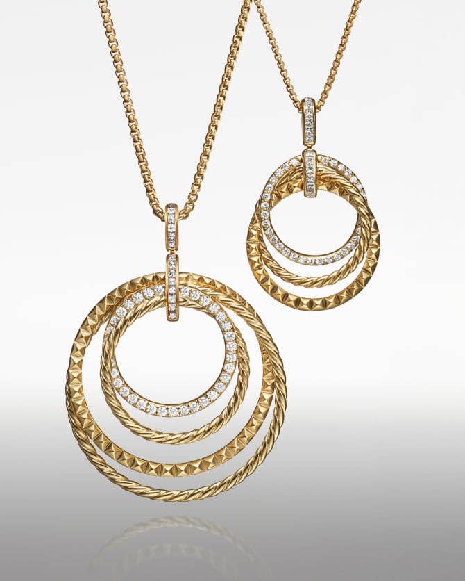 Two David Yurman Crossover pendant necklaces.