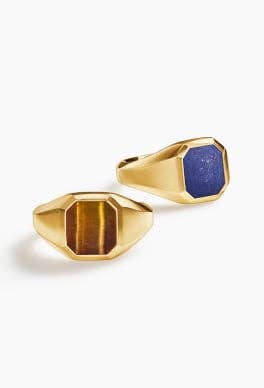 Two David Yurman gold signet rings.