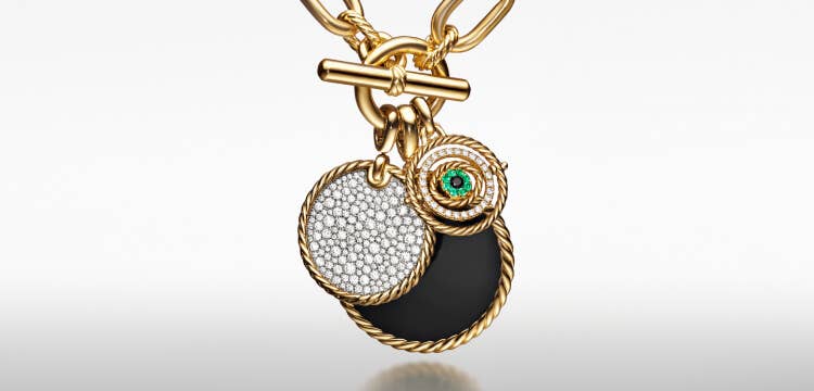 David Yurman's DY Elements amulets with a gold Madison chain.