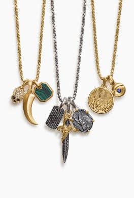 Eight David Yurman amulets with chain necklaces.