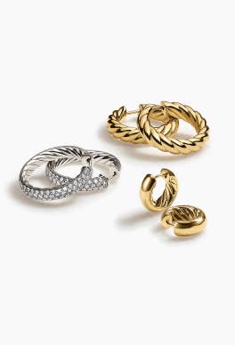 Three David Yurman hoop earrings.