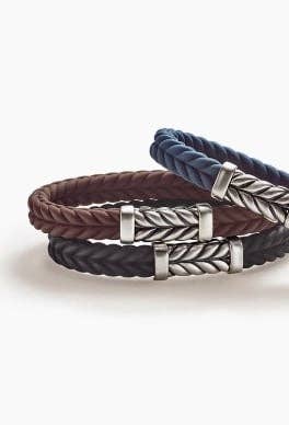 Trois bracelets David Yurman Chevron en caoutchouc.