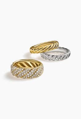 Three David Yurman Sculpted Cable band rings.