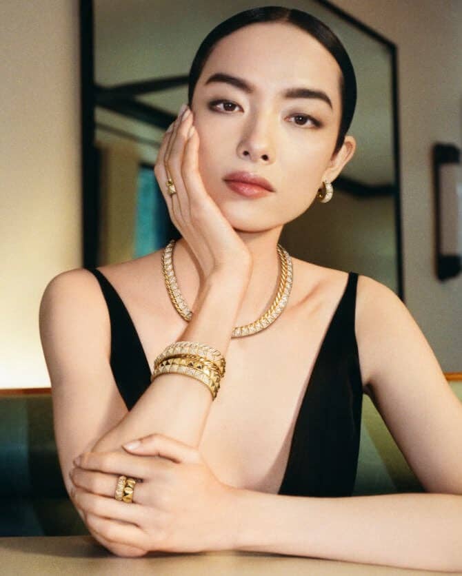 Fei Fei Sun wearing Crossover Trio jewelry.