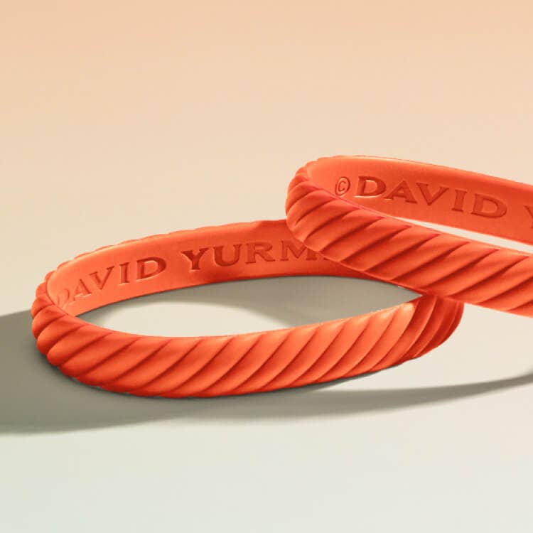 Shop the orange rubber bracelet to support the Trevor project.