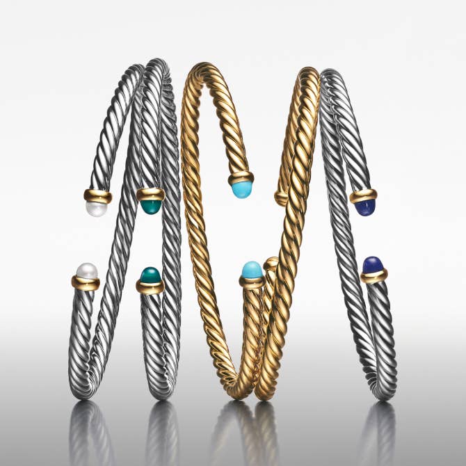 Five David Yurman Cable Flex bracelets.