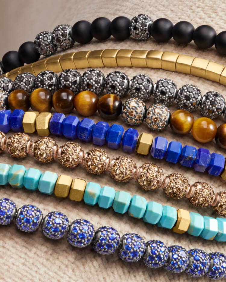 A stack of David Yurman Spiritual Bead chains.