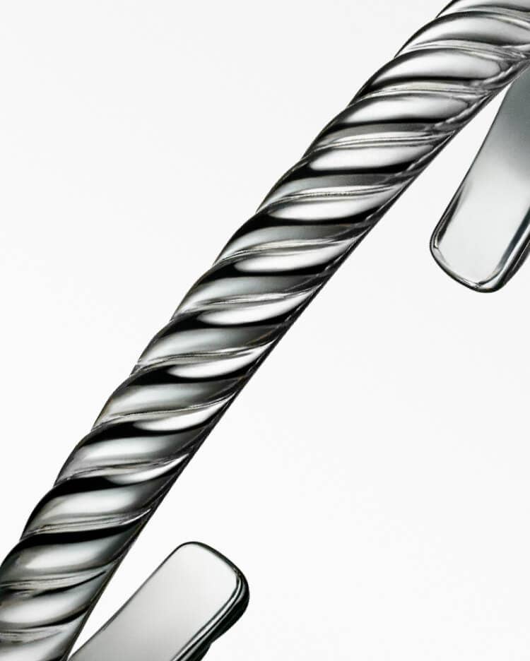 An image of a Sculpted Cable cuff bracelet in white gold.