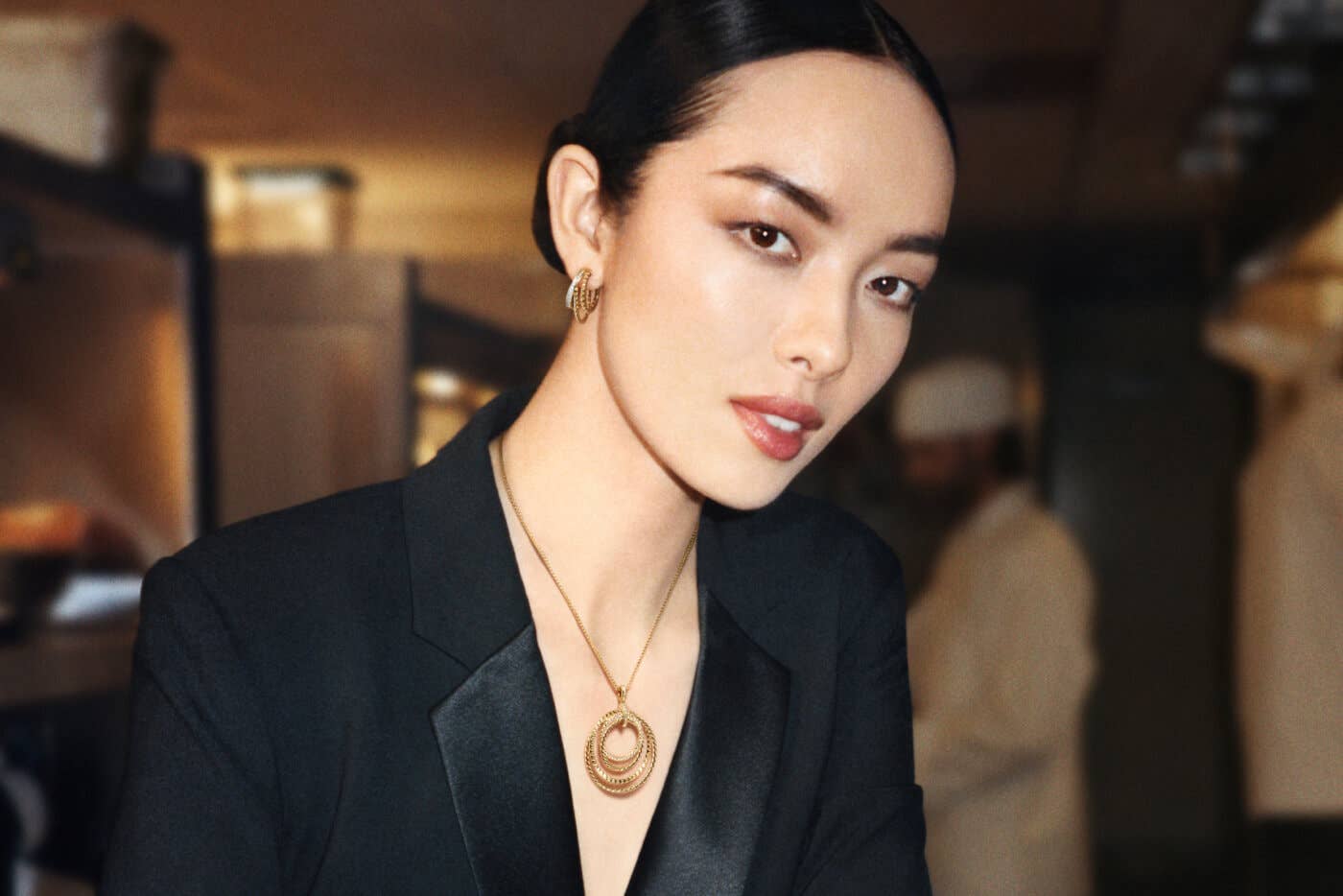 Fei Fei Sun wearing Crossover jewelry.