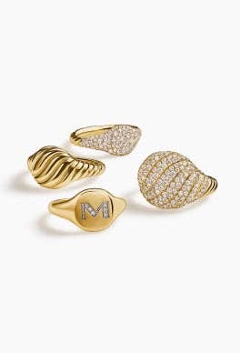 Four David Yurman pinky rings.