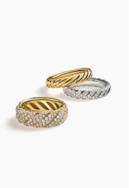 Three David Yurman band rings for women.