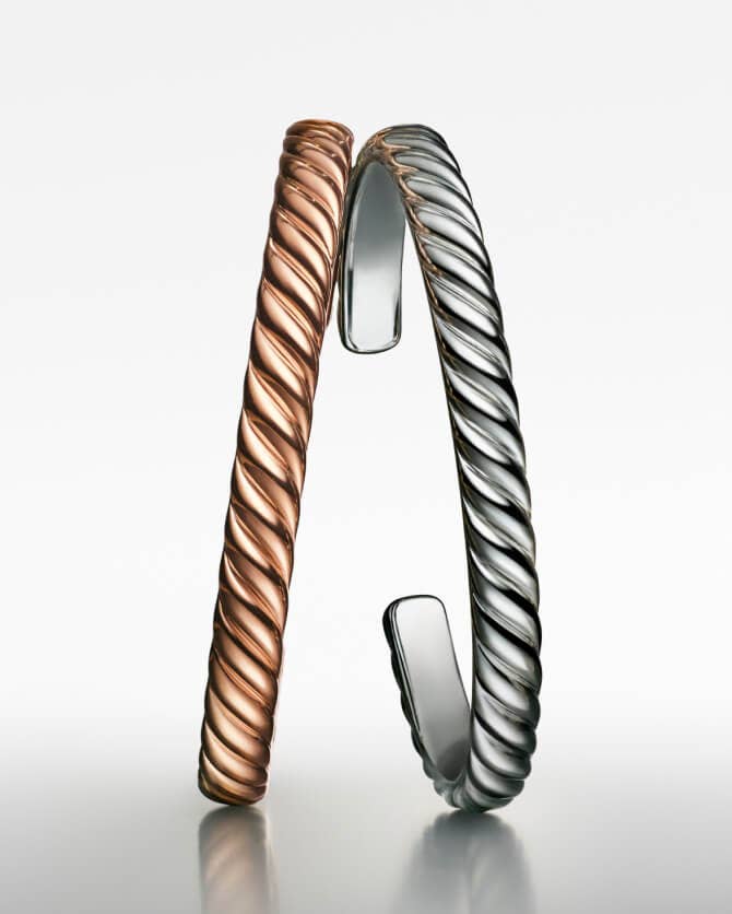 Two David Yurman Sculpted Cable cuff bracelets.